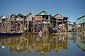 Tonle Sap - Kampong Phluk floating village - stilted houses 
